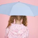A girl under umbrella